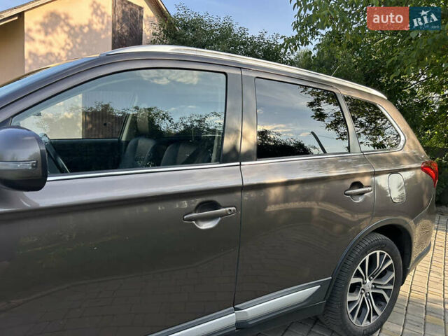 Коричневий Міцубісі Аутлендер, об'ємом двигуна 2.3 л та пробігом 256 тис. км за 16399 $, фото 9 на Automoto.ua