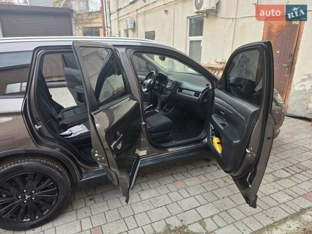 Коричневий Міцубісі Аутлендер, об'ємом двигуна 2.36 л та пробігом 176 тис. км за 15800 $, фото 15 на Automoto.ua