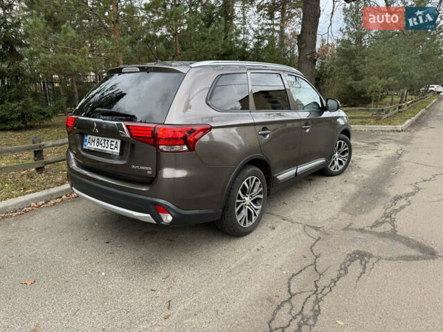 Коричневий Міцубісі Аутлендер, об'ємом двигуна 2.36 л та пробігом 167 тис. км за 12500 $, фото 15 на Automoto.ua