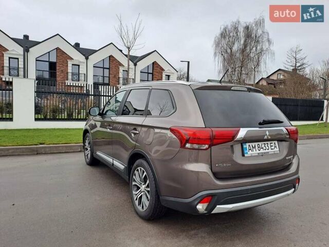 Коричневий Міцубісі Аутлендер, об'ємом двигуна 2.36 л та пробігом 167 тис. км за 13500 $, фото 4 на Automoto.ua