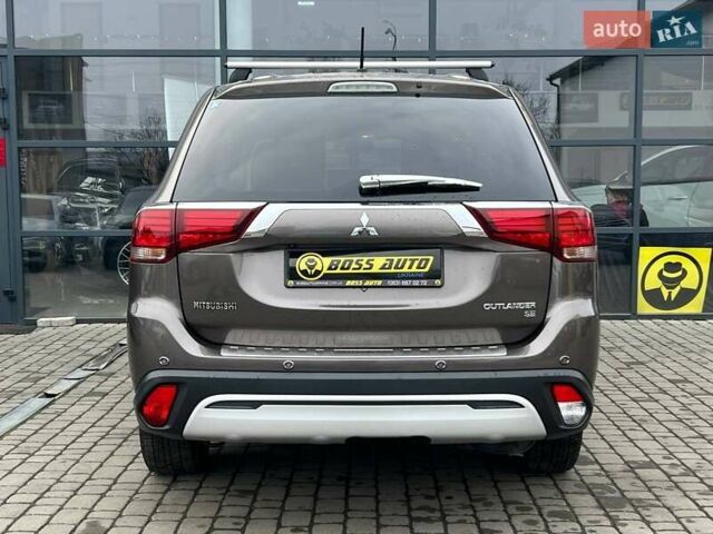 Коричневый Мицубиси Аутлендер, объемом двигателя 2.36 л и пробегом 160 тыс. км за 15000 $, фото 5 на Automoto.ua
