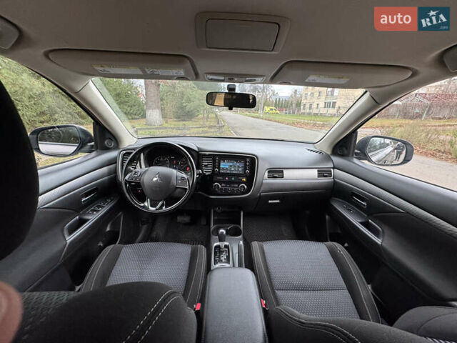 Коричневий Міцубісі Аутлендер, об'ємом двигуна 2.36 л та пробігом 167 тис. км за 12500 $, фото 5 на Automoto.ua