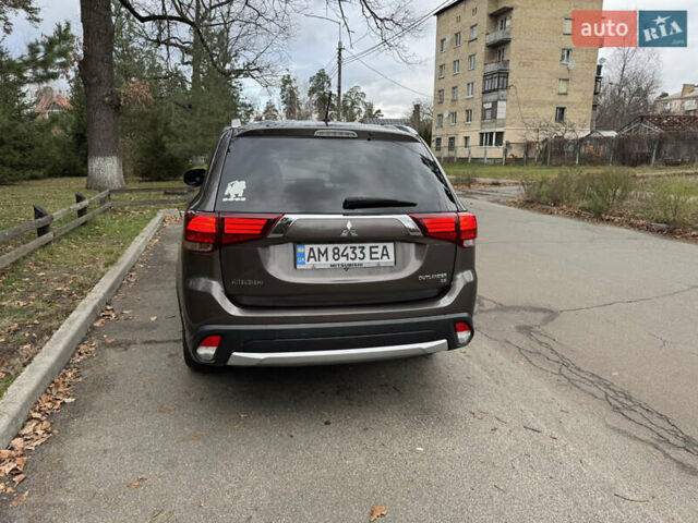 Коричневий Міцубісі Аутлендер, об'ємом двигуна 2.36 л та пробігом 167 тис. км за 12500 $, фото 16 на Automoto.ua