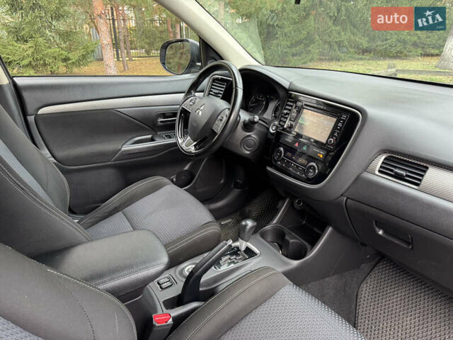 Коричневий Міцубісі Аутлендер, об'ємом двигуна 2.36 л та пробігом 167 тис. км за 12500 $, фото 4 на Automoto.ua