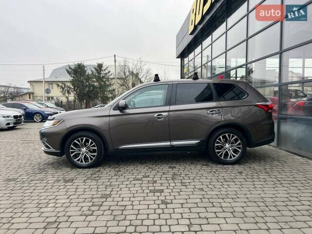 Коричневый Мицубиси Аутлендер, объемом двигателя 2.36 л и пробегом 160 тыс. км за 15000 $, фото 3 на Automoto.ua