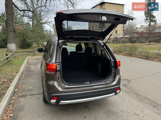 Коричневий Міцубісі Аутлендер, об'ємом двигуна 2.36 л та пробігом 167 тис. км за 12500 $, фото 12 на Automoto.ua