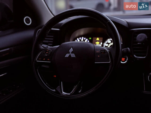 Коричневый Мицубиси Аутлендер, объемом двигателя 2.36 л и пробегом 188 тыс. км за 13000 $, фото 22 на Automoto.ua