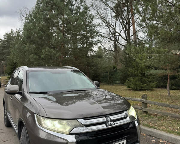 Коричневий Міцубісі Аутлендер, об'ємом двигуна 2.36 л та пробігом 167 тис. км за 12500 $, фото 1 на Automoto.ua