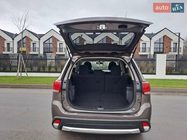 Коричневий Міцубісі Аутлендер, об'ємом двигуна 2.36 л та пробігом 167 тис. км за 13500 $, фото 6 на Automoto.ua