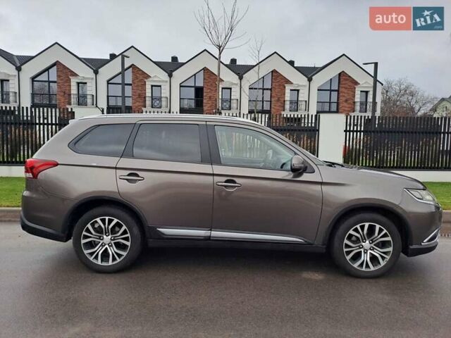 Коричневий Міцубісі Аутлендер, об'ємом двигуна 2.36 л та пробігом 167 тис. км за 13500 $, фото 8 на Automoto.ua