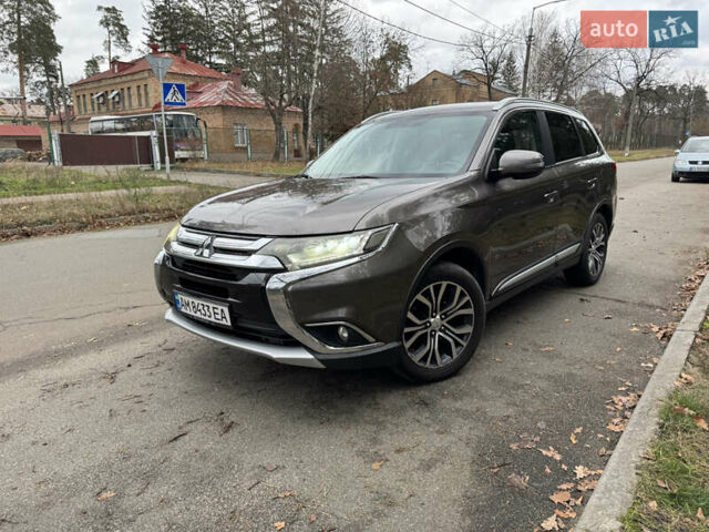 Коричневий Міцубісі Аутлендер, об'ємом двигуна 2.36 л та пробігом 167 тис. км за 12500 $, фото 19 на Automoto.ua