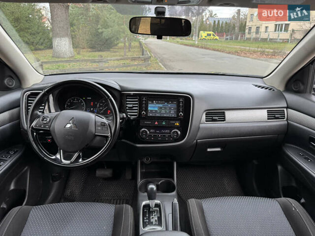 Коричневий Міцубісі Аутлендер, об'ємом двигуна 2.36 л та пробігом 167 тис. км за 12500 $, фото 8 на Automoto.ua