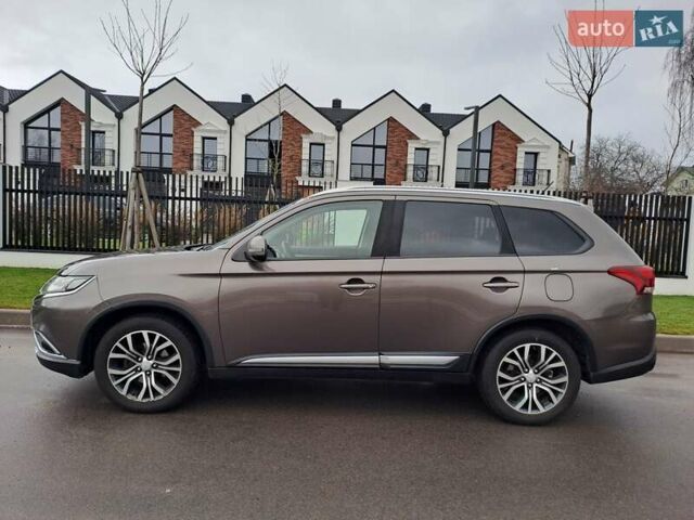 Коричневий Міцубісі Аутлендер, об'ємом двигуна 2.36 л та пробігом 167 тис. км за 13500 $, фото 2 на Automoto.ua