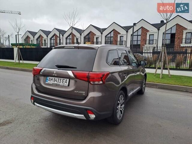 Коричневий Міцубісі Аутлендер, об'ємом двигуна 2.36 л та пробігом 167 тис. км за 13500 $, фото 7 на Automoto.ua