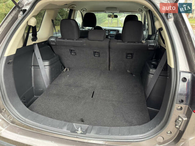 Коричневий Міцубісі Аутлендер, об'ємом двигуна 2.36 л та пробігом 167 тис. км за 12500 $, фото 11 на Automoto.ua
