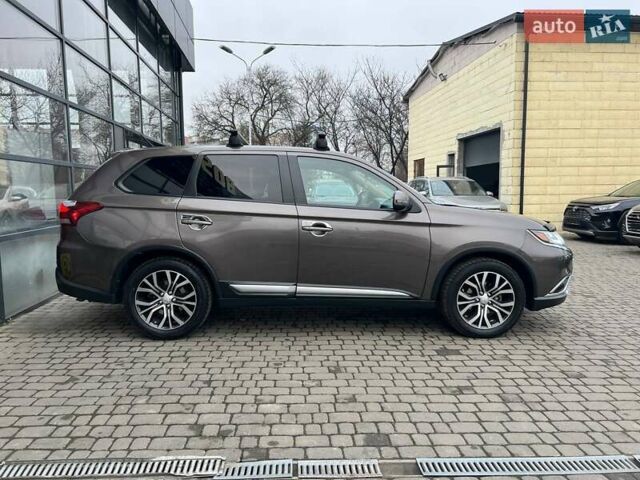 Коричневый Мицубиси Аутлендер, объемом двигателя 2.36 л и пробегом 160 тыс. км за 15000 $, фото 7 на Automoto.ua