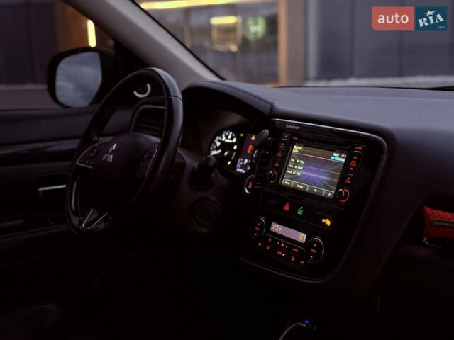 Коричневый Мицубиси Аутлендер, объемом двигателя 2.36 л и пробегом 188 тыс. км за 13000 $, фото 19 на Automoto.ua