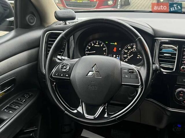 Коричневый Мицубиси Аутлендер, объемом двигателя 2.36 л и пробегом 160 тыс. км за 15000 $, фото 9 на Automoto.ua