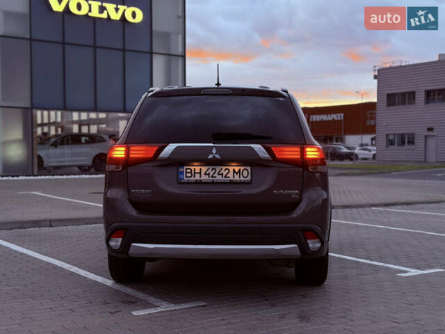 Коричневый Мицубиси Аутлендер, объемом двигателя 2.36 л и пробегом 188 тыс. км за 13000 $, фото 6 на Automoto.ua