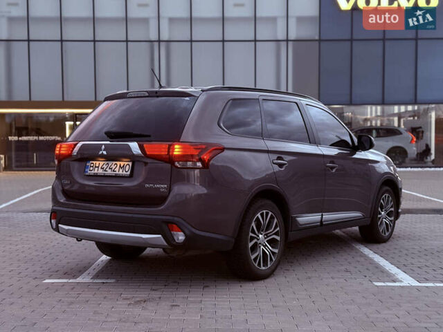 Коричневый Мицубиси Аутлендер, объемом двигателя 2.36 л и пробегом 188 тыс. км за 13000 $, фото 5 на Automoto.ua