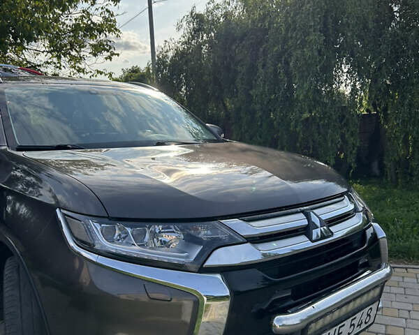 Коричневий Міцубісі Аутлендер, об'ємом двигуна 2.3 л та пробігом 256 тис. км за 16399 $, фото 13 на Automoto.ua