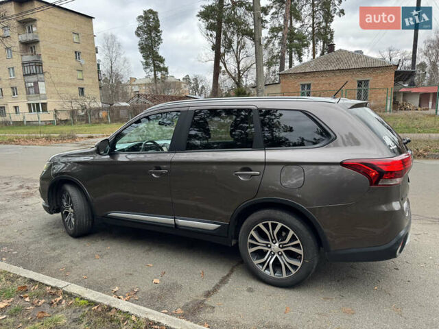 Коричневий Міцубісі Аутлендер, об'ємом двигуна 2.36 л та пробігом 167 тис. км за 12500 $, фото 17 на Automoto.ua