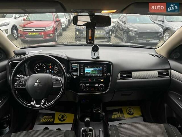 Коричневый Мицубиси Аутлендер, объемом двигателя 2.36 л и пробегом 160 тыс. км за 15000 $, фото 13 на Automoto.ua