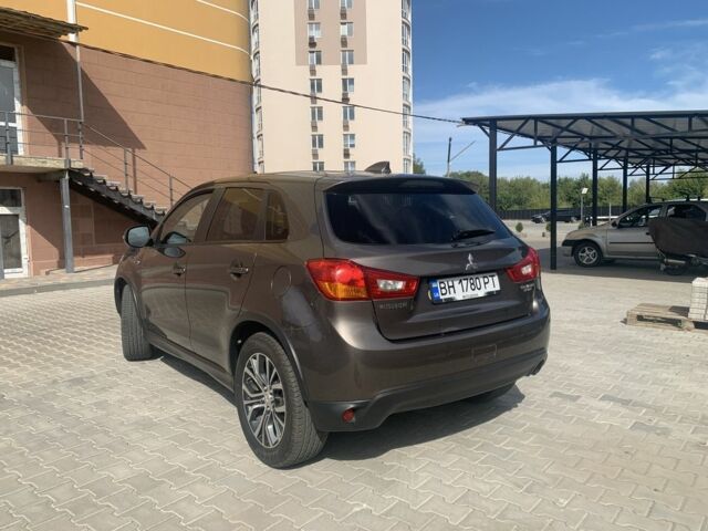 Коричневый Мицубиси Аутлендер, объемом двигателя 2 л и пробегом 210 тыс. км за 12500 $, фото 6 на Automoto.ua