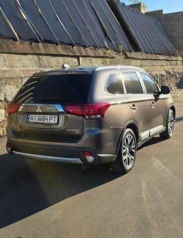 Коричневый Мицубиси Аутлендер, объемом двигателя 2.36 л и пробегом 168 тыс. км за 16500 $, фото 7 на Automoto.ua