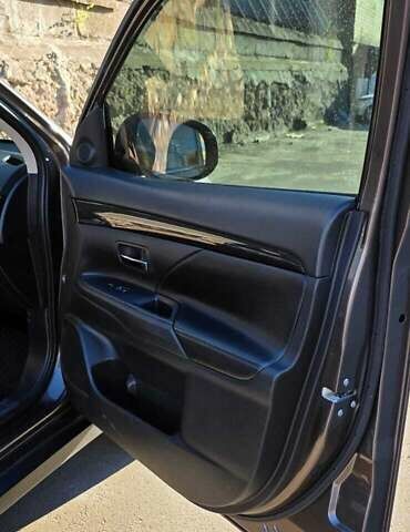 Коричневый Мицубиси Аутлендер, объемом двигателя 2.36 л и пробегом 168 тыс. км за 16500 $, фото 14 на Automoto.ua