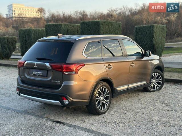 Коричневый Мицубиси Аутлендер, объемом двигателя 2.36 л и пробегом 115 тыс. км за 15500 $, фото 7 на Automoto.ua