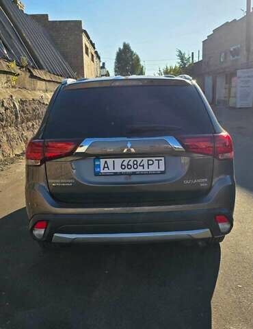 Коричневый Мицубиси Аутлендер, объемом двигателя 2.36 л и пробегом 168 тыс. км за 16500 $, фото 5 на Automoto.ua