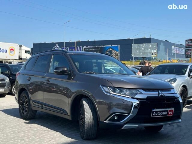 Коричневий Міцубісі Аутлендер, об'ємом двигуна 2.4 л та пробігом 134 тис. км за 15490 $, фото 2 на Automoto.ua