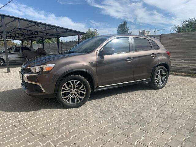 Коричневый Мицубиси Аутлендер, объемом двигателя 2 л и пробегом 210 тыс. км за 12500 $, фото 2 на Automoto.ua