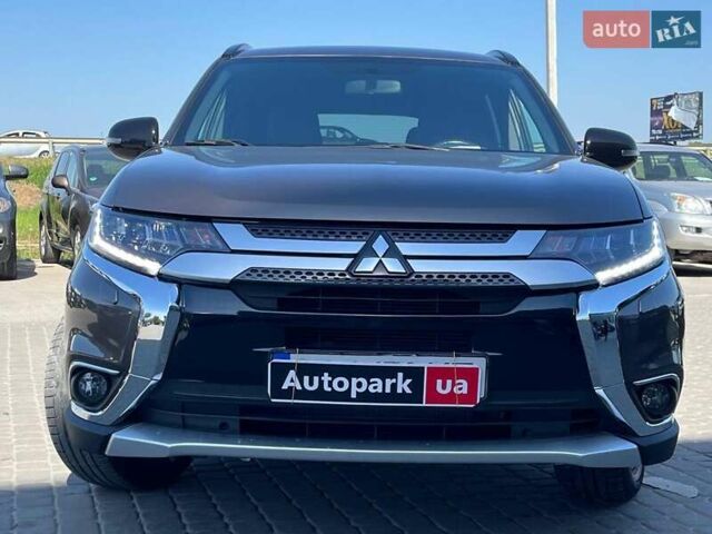 Коричневий Міцубісі Аутлендер, об'ємом двигуна 2.4 л та пробігом 134 тис. км за 15490 $, фото 1 на Automoto.ua