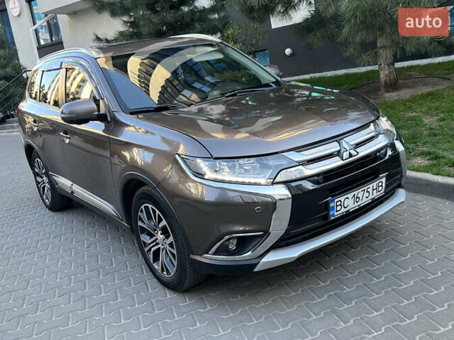 Коричневий Міцубісі Аутлендер, об'ємом двигуна 2.36 л та пробігом 170 тис. км за 16500 $, фото 1 на Automoto.ua