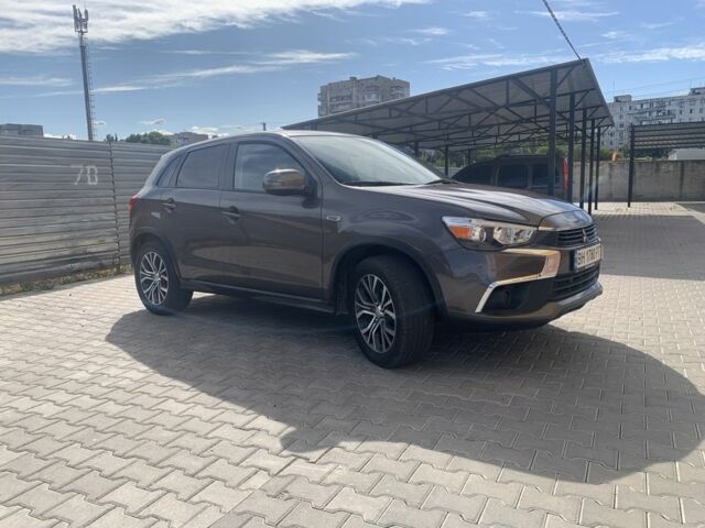 Коричневый Мицубиси Аутлендер, объемом двигателя 2 л и пробегом 210 тыс. км за 12500 $, фото 3 на Automoto.ua