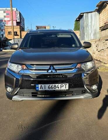 Коричневый Мицубиси Аутлендер, объемом двигателя 2.36 л и пробегом 168 тыс. км за 16500 $, фото 3 на Automoto.ua