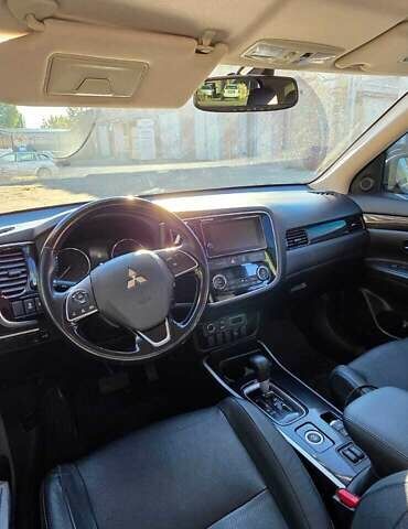 Коричневый Мицубиси Аутлендер, объемом двигателя 2.36 л и пробегом 168 тыс. км за 16500 $, фото 8 на Automoto.ua