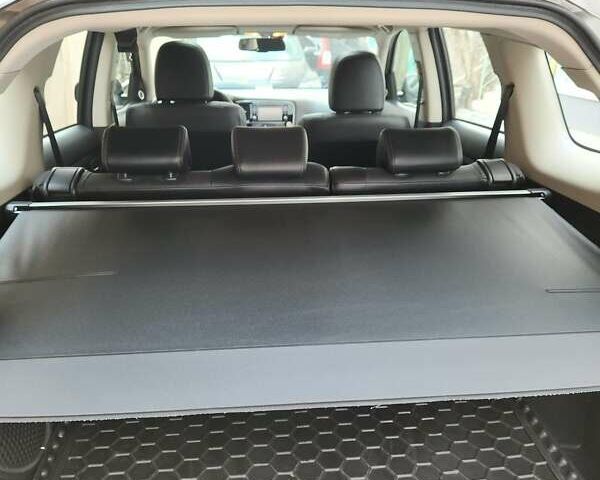 Коричневый Мицубиси Аутлендер, объемом двигателя 2.36 л и пробегом 84 тыс. км за 17500 $, фото 2 на Automoto.ua