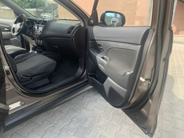 Коричневый Мицубиси Аутлендер, объемом двигателя 2 л и пробегом 210 тыс. км за 12500 $, фото 15 на Automoto.ua