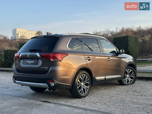 Коричневый Мицубиси Аутлендер, объемом двигателя 2.36 л и пробегом 115 тыс. км за 15500 $, фото 6 на Automoto.ua