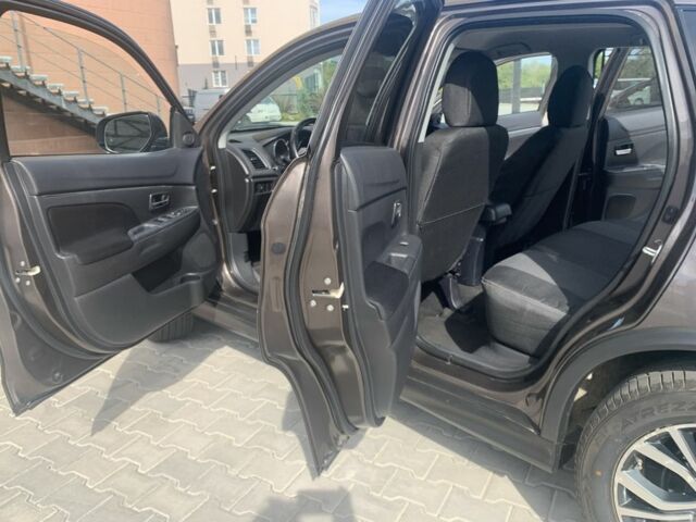 Коричневый Мицубиси Аутлендер, объемом двигателя 2 л и пробегом 210 тыс. км за 12500 $, фото 18 на Automoto.ua