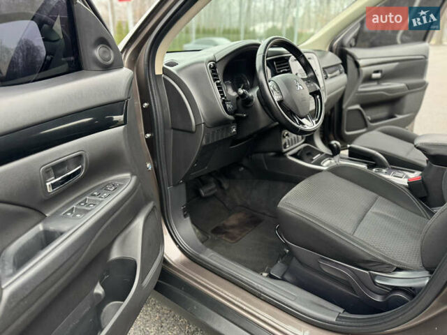 Коричневый Мицубиси Аутлендер, объемом двигателя 2 л и пробегом 154 тыс. км за 14999 $, фото 39 на Automoto.ua