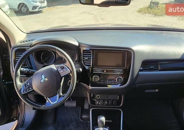 Коричневый Мицубиси Аутлендер, объемом двигателя 2 л и пробегом 175 тыс. км за 18900 $, фото 7 на Automoto.ua