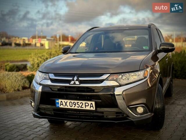 Коричневый Мицубиси Аутлендер, объемом двигателя 2.36 л и пробегом 58 тыс. км за 19500 $, фото 4 на Automoto.ua