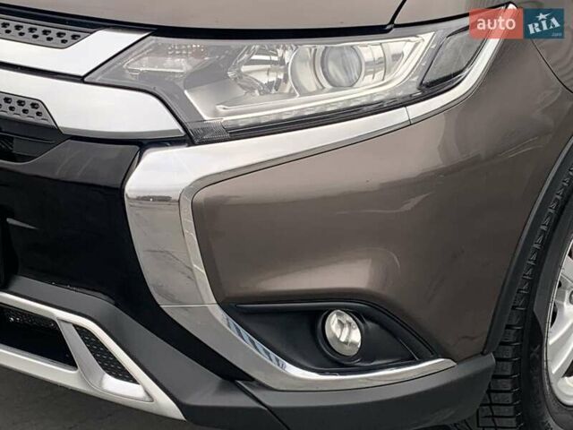 Коричневий Міцубісі Аутлендер, об'ємом двигуна 2 л та пробігом 125 тис. км за 18700 $, фото 50 на Automoto.ua