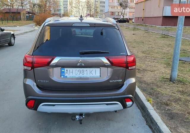 Коричневый Мицубиси Аутлендер, объемом двигателя 2 л и пробегом 175 тыс. км за 17900 $, фото 2 на Automoto.ua