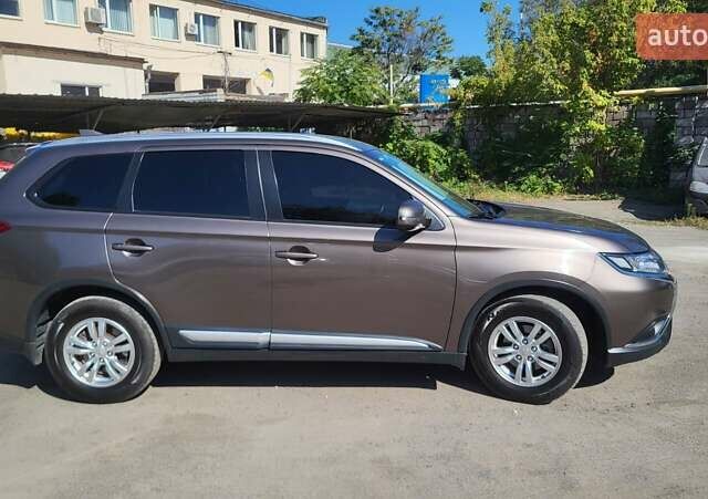 Коричневый Мицубиси Аутлендер, объемом двигателя 2 л и пробегом 175 тыс. км за 18900 $, фото 5 на Automoto.ua