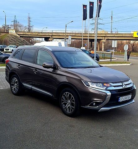 Коричневий Міцубісі Аутлендер, об'ємом двигуна 2.4 л та пробігом 129 тис. км за 20499 $, фото 2 на Automoto.ua